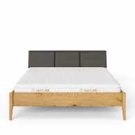 Łóżko dębowe z tapicerowanym zagłówkiem - Möbel Cloe