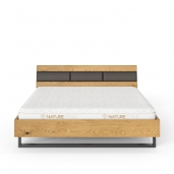 Łóżko z litego drewna dębowego z tapicerowanym elementem na zagłówku - Möbel Steel